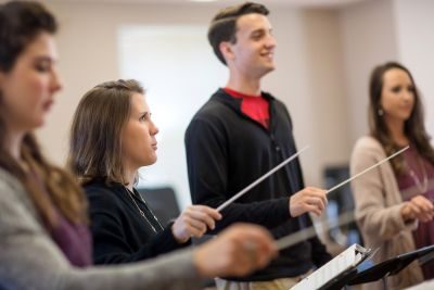 Students practicing conducting