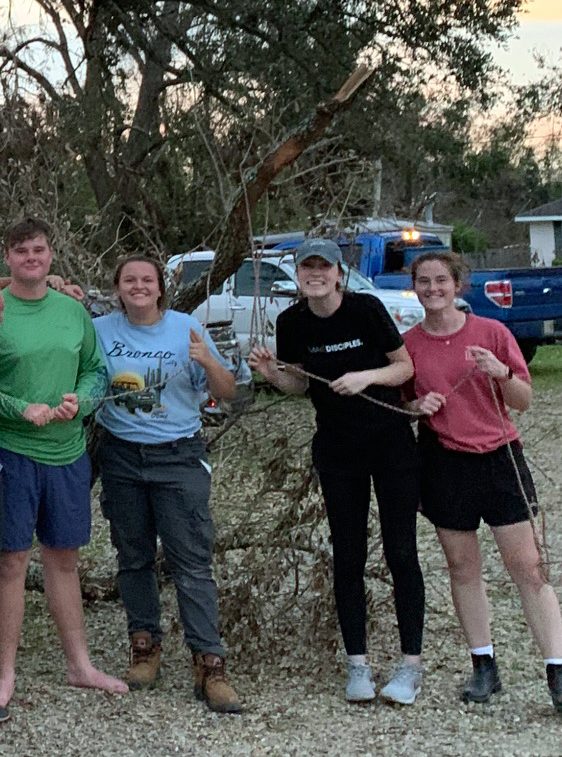 Helping residents of St. Rose, Louisiana, recover during the Labor Day weekend after Hurricane Ida damaged much of the small river town are Mississippi College students, from left, Reece Hindt, Shelby Miller, Holly Rogers, and Emily Hindt.