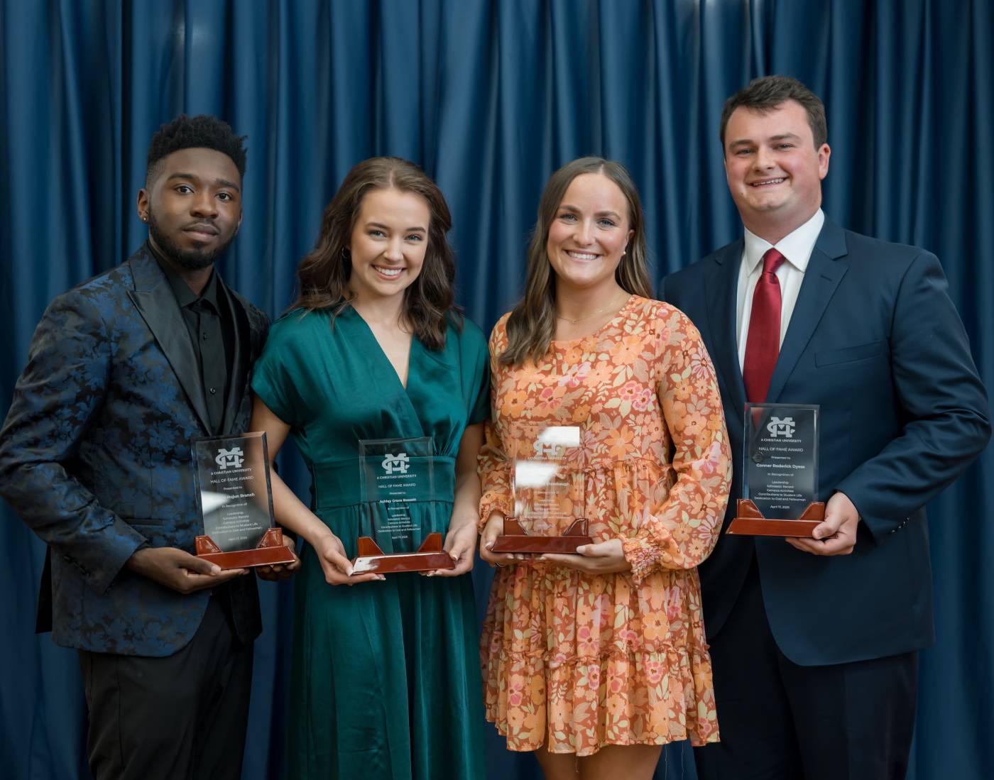 MC Class of 2025 Hall of Fame members, from left, Xavian Branch, Ashley Grace Bassett, Sarah Beth Stambaugh and Conner Dyess, gather for a photo at the Student Experience Awards Gala.