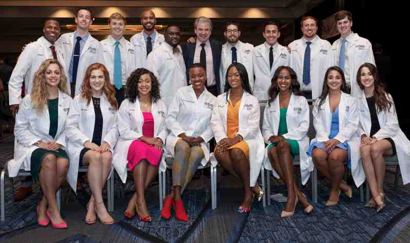 Dr. Stan Baldwin, dean of the Mississippi College School of Science & Mathematics, joins MC graduates at a recent Tufts University School of Dentistry White Coat ceremony. There are 18 MC graduates enrolled at the Tufts dental school in Boston this Fall.