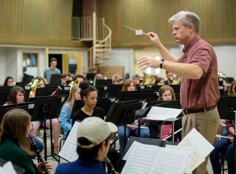 Dr. Craig Young, right, MC band director, will serve as a conductor during the MC Music Honors Concert 2022.