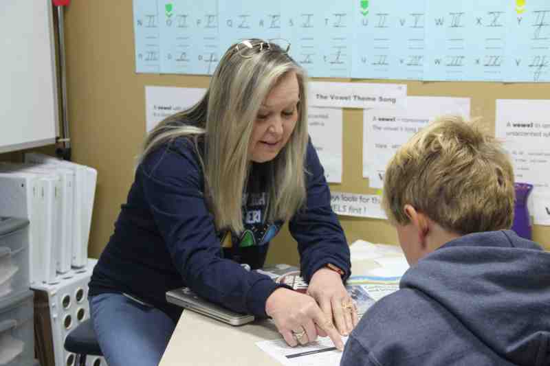 Cindy B. Prewitt, dyslexia therapist and program director at Annunciation Catholic School in Columbus, helped lead a fund-raising activity at the school to benefit MC's Dyslexia Center.