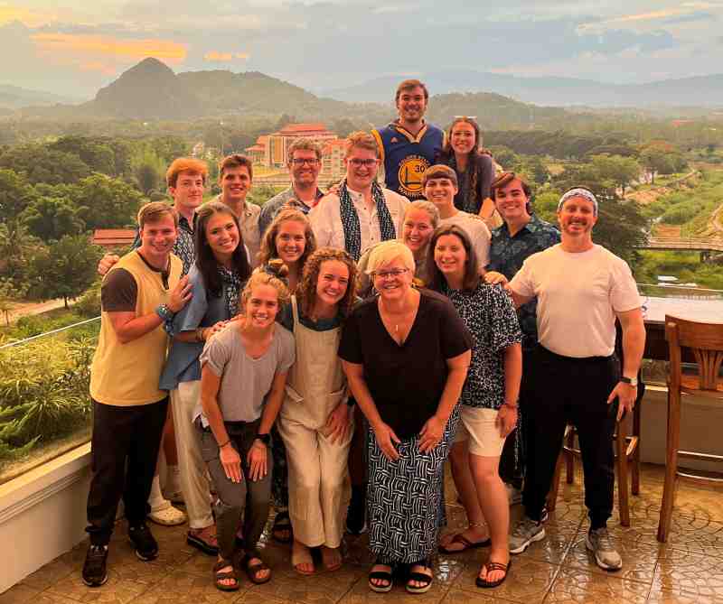 Dr. Erin Norcross, front row, right, and Dr. Beth Stapleton, front row, second from right, join the inaugural cohort of MC Honors College students enjoying the scenery near Chiang Mai, Thailand.
