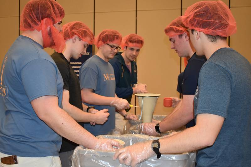 Student volunteers at Mississippi College package meals to be distributed to the world's most vulnerable through Rise Against Hunger. 