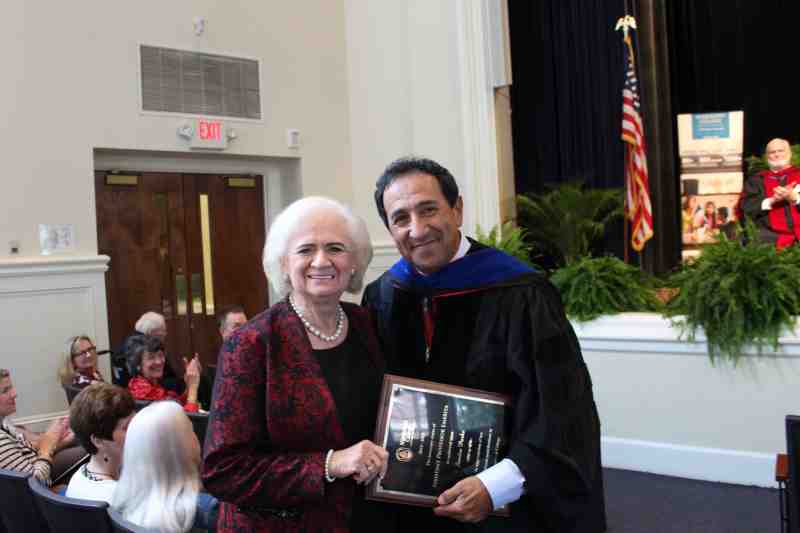 Retired Mississippi College accounting professor Sandra Parks is pictured with School of Education Dean Marcelo Eduardo at Swor Auditorium. Parks was honored by receiving professor emerita status at the university's convocation on August 17.