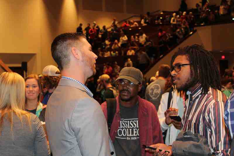 Mississippi College students stopped to visit with Texas evangelist Shane Pruitt after his lecture at a chapel program First Baptist Church Clinton on Feb. 4.