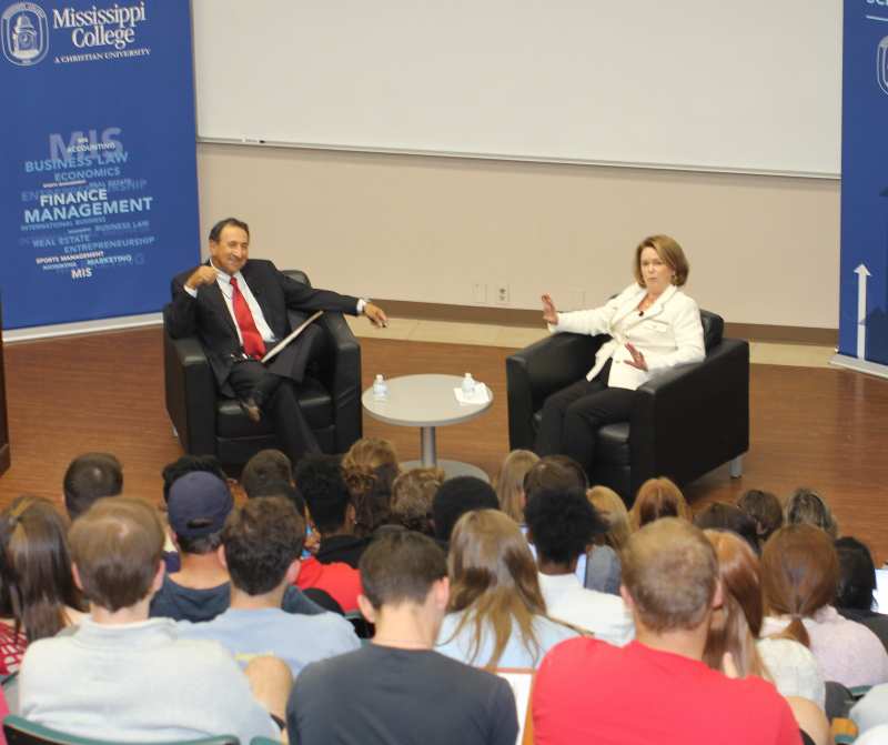 Dr. Marcelo Eduardo, dean of the School of Business, interviews Paula Graves Ardelean, the school's 2022 Distinguished Alumna of the Year, Oct. 27 in front of a packed house of students in the John and Ed Trehern Business Lecture Hall in Self Hall. 