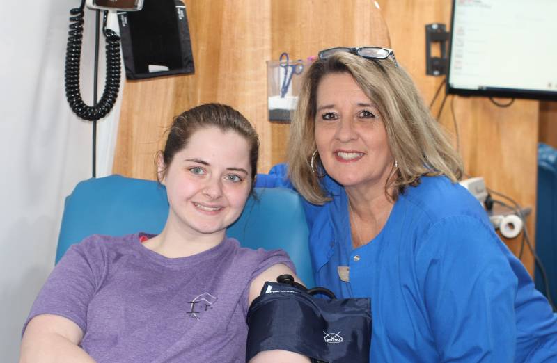 Katie Bryant, left, said Mississippi Blood Services professionals like Angie Peterson, donor specialist, make giving blood a snap for Mississippi College students.