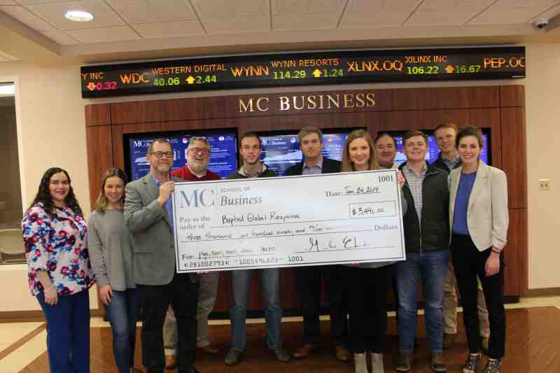 Jeff Palmer, CEO of Nashville-based Baptist Global Response, visited the Mississippi College School of Business on January. 24. He visited to accept a check for more than $3,000 to benefit BGR initiatives. Students from six MC School of Business student organizations raised the cash in December. Led by professor Billy Morehead, the Accounting Society raised the most money.