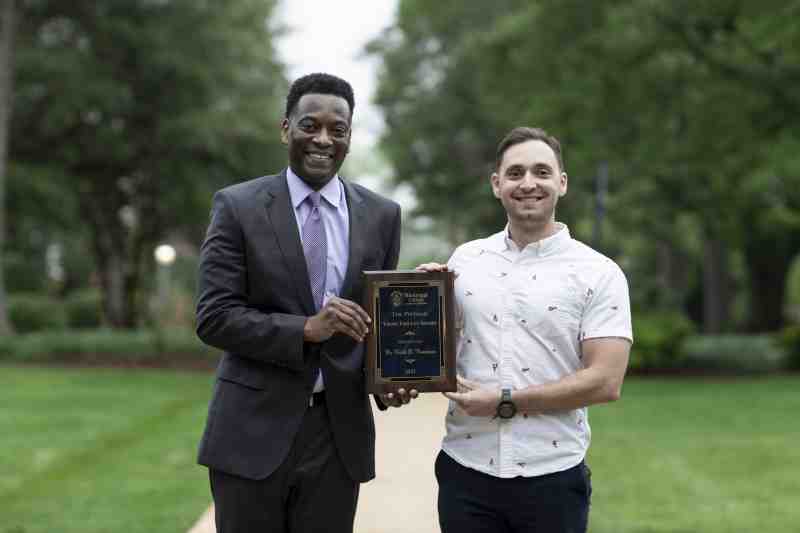 Executive Vice President and Provost Keith Elder and MC’s Young Professor of the Year Keith Randazzo