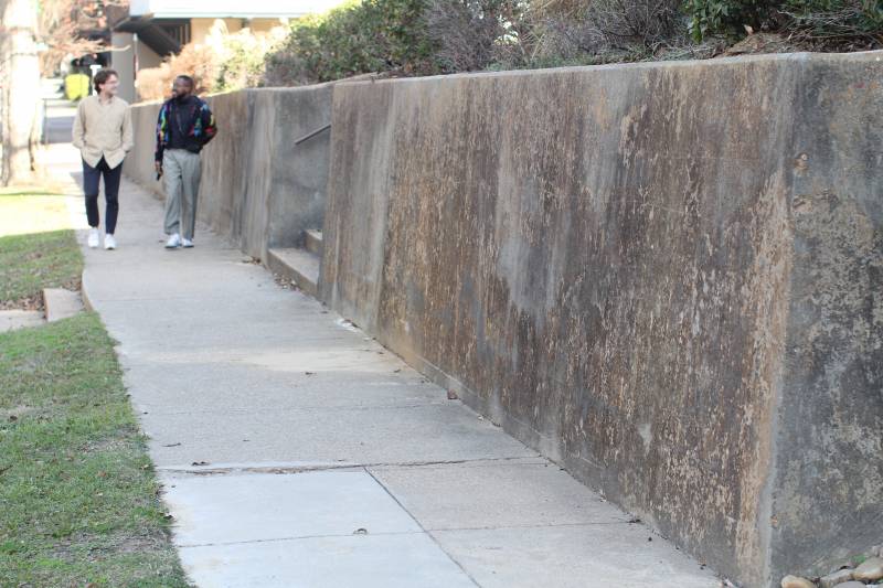 Clinton Public Art Committee members plan to transform the 110-foot-long retaining wall on Jefferson Street into a beautiful mosaic depicting the city's rich history.