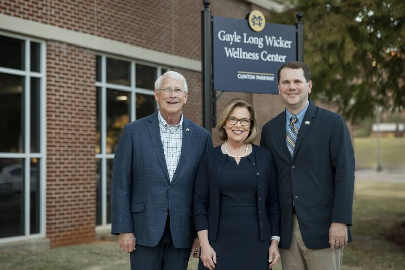 MC President Blake Thompson, right, visits with Gayle Long Wicker and her husband, U.S. Sen. Roger Wicker, shortly after the naming ceremony for the Gayle Long Wicker Wellness Center at Mississippi College Oct. 25.