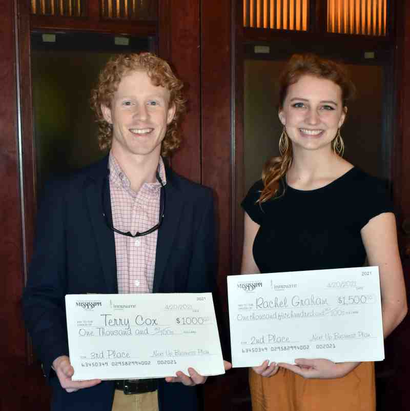 MC business students Terry Cox and Rachel Graham received awards at the 6th annual Mississippi Entrepreneurship Forum in April.