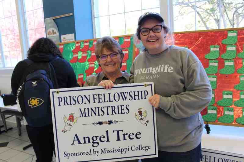 Mississippi College students faculty and staff are once again supporting Prison Fellowship's Angel Tree project. Community Service Center Director Shari Barnes is pictured on November 26 with MC freshman Raley Holman, 18, of Athens, Georgia.