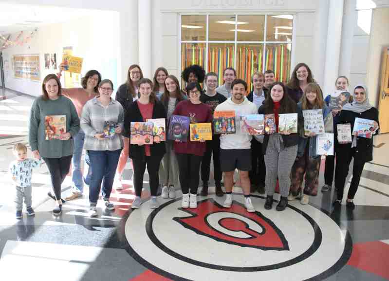 Ashley Crason, back row, second from right, and members of her MLG 450 class at Mississippi College visit Eastside Elementary School and Rebecca Brill, front row, left, after class to see their Cultural Awareness Center in person. Class members include, front row from left, Ellie Kendall, Liliana Talazac, Alli Dowdy, Savannah Sweeney, Vanessa Sharp, David Torrent, Avery Kosmicki, Caylen Harms, Joy Mullins, and Hanan Alolaimi, and back row from left, Jheslia Vidal-Alonso, Raley Holman, Emily Grace Boutwell, Camryn Johnson, Micah Davis, Wyatt Mason, and Catherine Combs.
