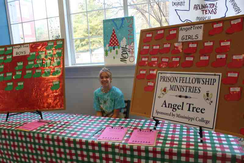MC senior Anna Vandercook of New Orleans is pictured at the Angel Tree table in November 2019.