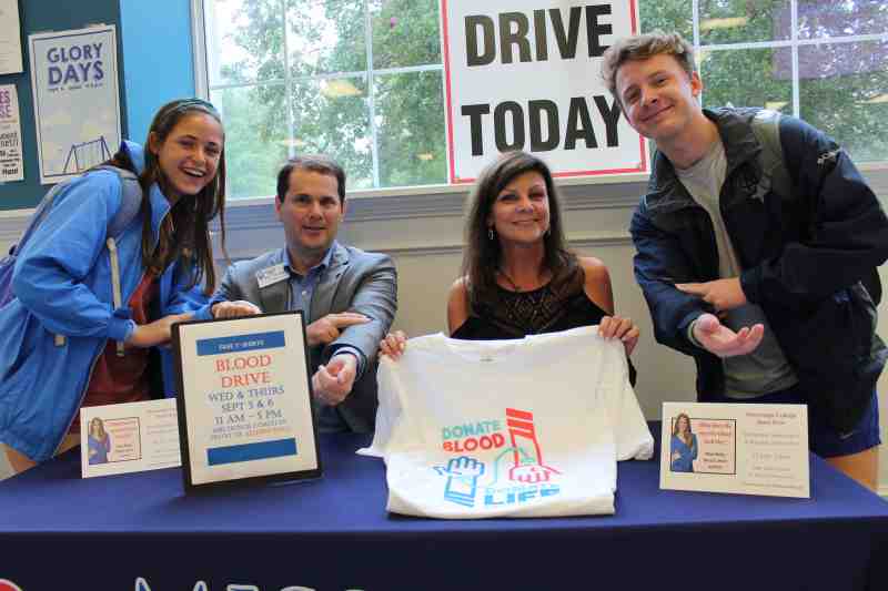 Mississippi College student Grace Dugas of Denham Springs, La. joins President Blake Thompson  Mississippi Blood Services senior marketing representative Tammy Bouchillon and MC sophomore Austin Spencer at an MBS drive on the Clinton campus. 