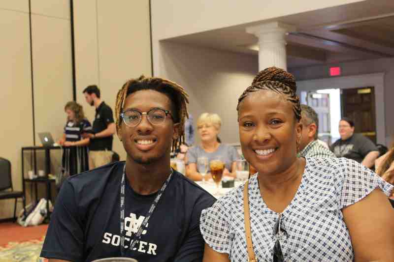Mississippi College student Chris Williams joins his mom, Resell Gibson Williams, at a luncheon at the university's transfer orientation. Chris will join the MC Choctaws soccer team. He transferred from a university in Hawaii.
