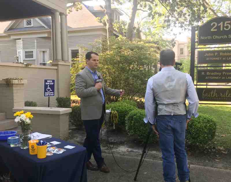 President Blake Thompson is interviewed by WCBI-TV Columbus reporter Allie Martin prior to an MC alumni gathering in Tupelo on May 16. Martin serves as chief of the television station's Tupelo Bureau.