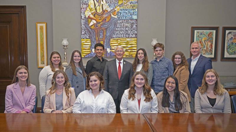 The contingent of Mississippi College faculty and students meeting with U.S. Sen. Roger Wicker (back row, fourth from left) includes, front row from left, Isabel McConnell, Kathryn Johnson, Caroline Hunt, Kyla Meadows, Alana Magliolo, and Abby Spires; and back row from left, Madison Dean (instructor in communication), Amy Priest, Marco Pineda, Gabriella White, Justin May, Liliana Talazac, and Reid Vance (associate professor and chair of communication).