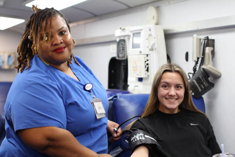 Corey Knox, MBS donor specialist, draws blood from Clara Ann Yeates during the January MBS Blood Drive at Mississippi College.