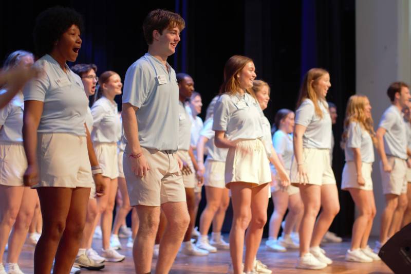 Student orientation leaders perform a routine to welcome incoming freshmen and transfers and their family members to Mississippi College during summer orientation.