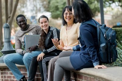 International students talking on campus.